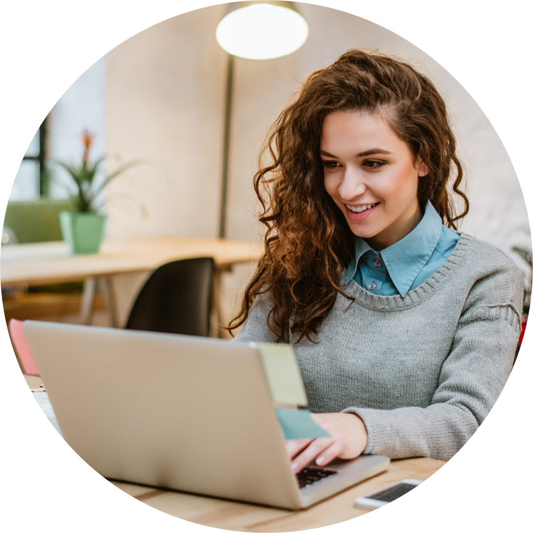 woman using laptop circle